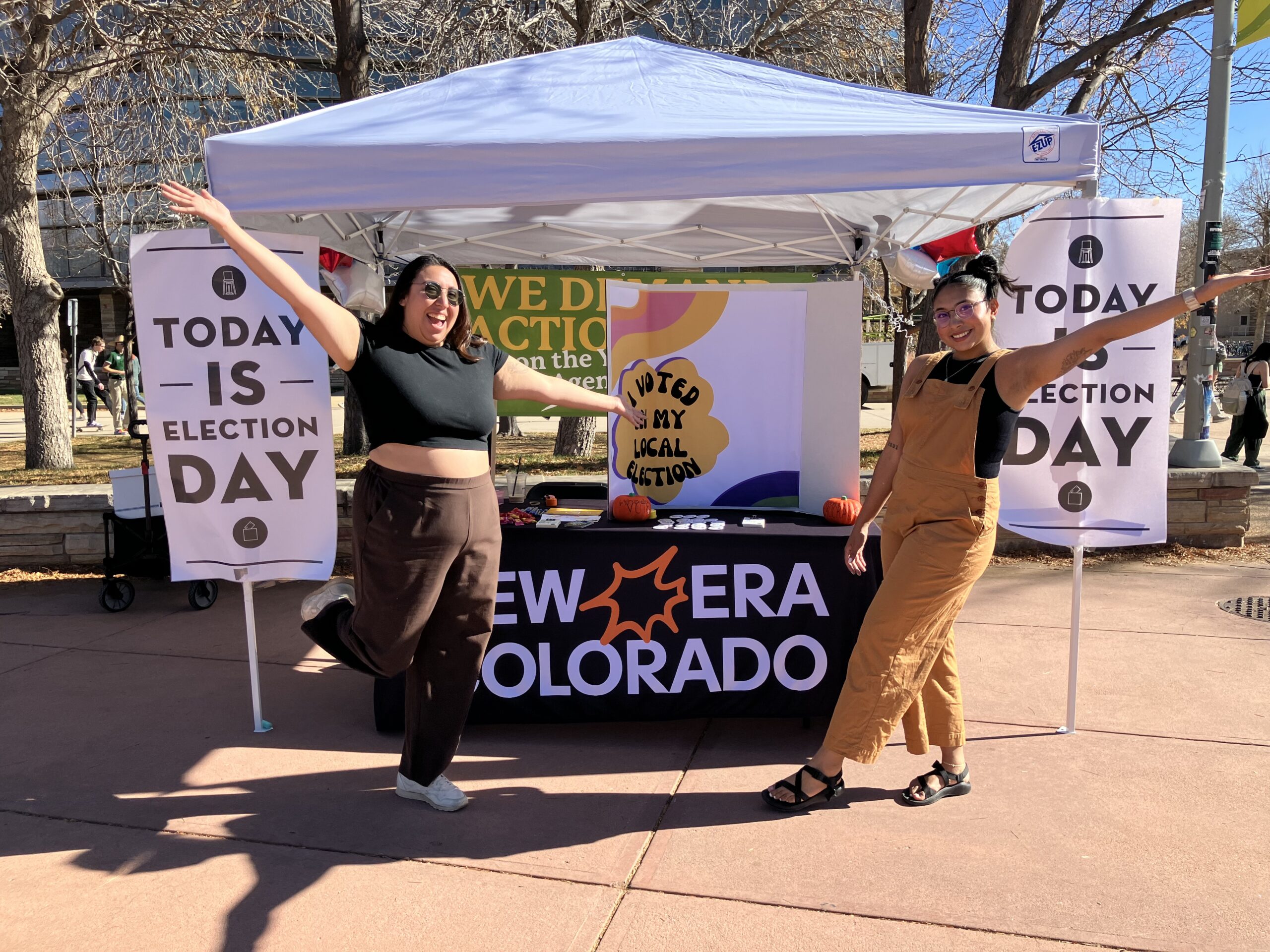 Organizing Director Arianna and Regional Lead Organizer Kim at a table in 2023.